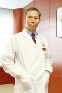 梁偉明博士